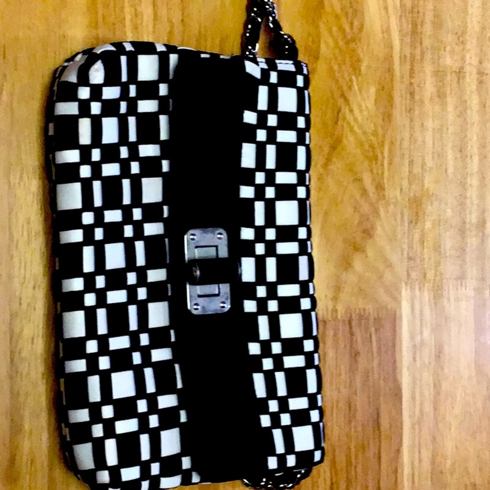 White and black clutch good condition no damage